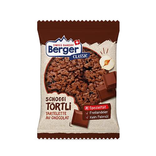 Berger Schoggitörtli 50g Ein purer Genuss für alle Schokoladen-Liebhaber. Die luftige Masse ist mit echten Schokoladenstücken und feinstem Kakao gebacken und enthält hochwertige Haselnüsse und reine Butter. Ohne Palmöl,.